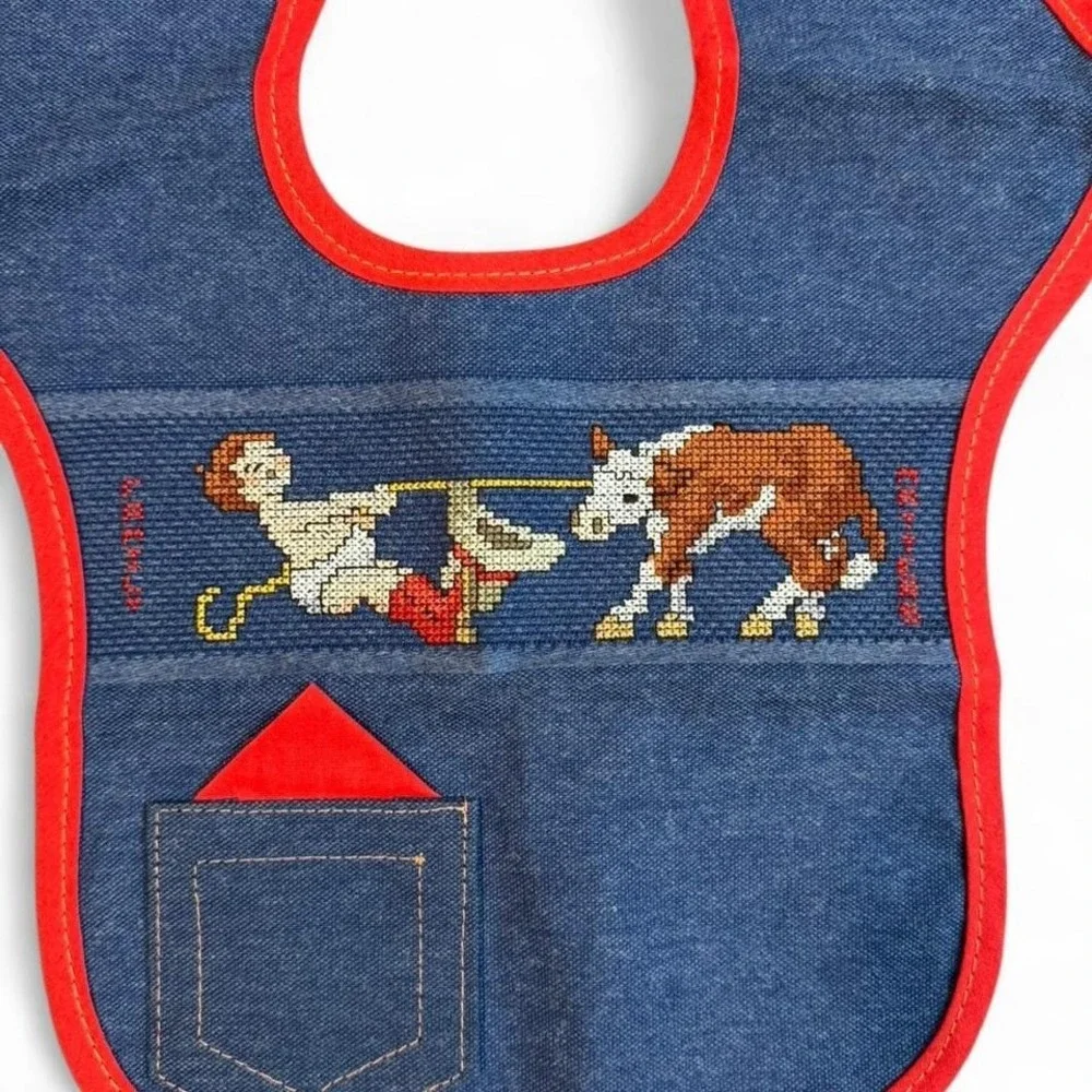 vintage Charles Craft denim cross-stitch baby‎ bib featuring a cowboy and calf
